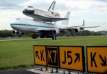 One Shuttle Moves In, Another Moves Out