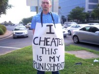 Cheating Hubby With Sign: Yep, a Hoax