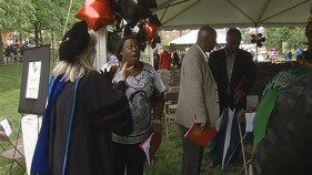 Mom Accepts Son's Diploma