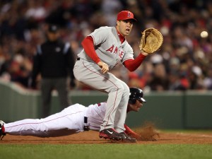 Mark Teixeira tries to get out Jed Lowrie of the Boston Red Sox after catcher Mark Napoli tried to catch Lowrie leading off during Game Four of the American League Championship Series on Oct. 6, 2008,