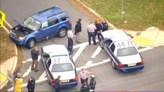 Raw Video: Alleged "Blonde Bandit" Taken Into Custody