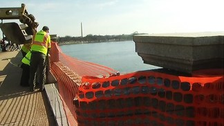 Crew Blocks 28-Foot Hole in Memorial Bridge Barrier