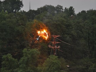 Power Lines Catch Fire Near Tracks