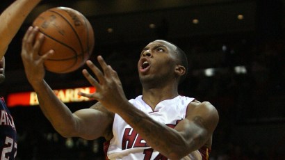 MIAMI - DECEMBER 12: Daequan Cook #14 of the Miami Heat drives against the Atlanta Hawks at American Airlines Arena on December 12, 2008 in Miami, Florida. NOTE TO USER: User expressly acknowledges a MIAMI - DECEMBER 12: Daequan Cook #14 of the Miami Heat drives against the Atlanta Hawks at American Airlines Arena on December 12, 2008 in Miami, Florida. NOTE TO USER: User expressly acknowledges a