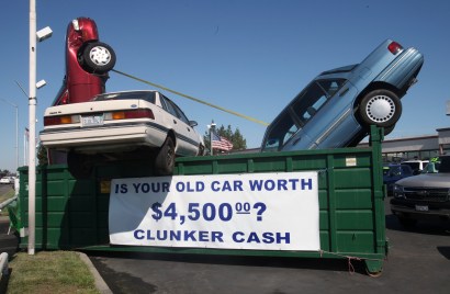 Used cars are seen in a dumpster to draw attention to the "Cash for Clunkers" program at Performance Chevrolet in Sacramento, Calif., Saturday, Aug. 1, 2009. On Friday Congress approved an additional $2 billion for the program that provides $3,500 or $4 Used cars are seen in a dumpster to draw attention to the "Cash for Clunkers" program at Performance Chevrolet in Sacramento, Calif., Saturday, Aug. 1, 2009. On Friday Congress approved an additional $2 billion for the program that provides $3,500 or $4