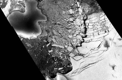 This satellite image shows the ice bergs breaking away from the Wilkins Ice Shelf. 