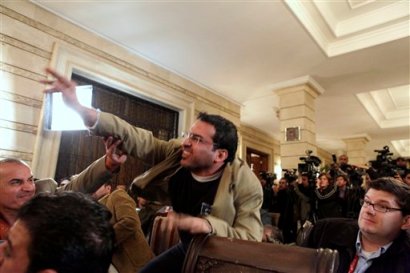 Muntadhar al-Zeidi was initially held by the prime minister's guards and later turned over to the Iraqi army's Baghdad command, according to Iraqi officials. Muntadhar al-Zeidi was initially held by the prime minister's guards and later turned over to the Iraqi army's Baghdad command, according to Iraqi officials.
