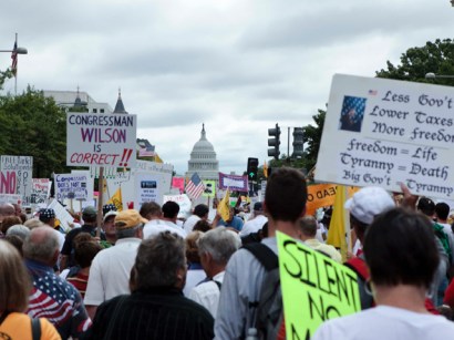 Protesters march to Capitol Hill during the Tea Party Express rally on September 12. Thousands of protesters gathered in Washington to protest high spending, higher taxes and the growth of the federal