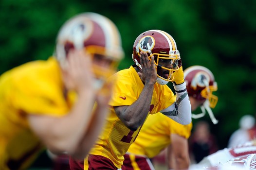 RGIII Models New Adidas Shoes