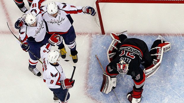 Caps Keep Playoff Hopes Alive -- Just Barely