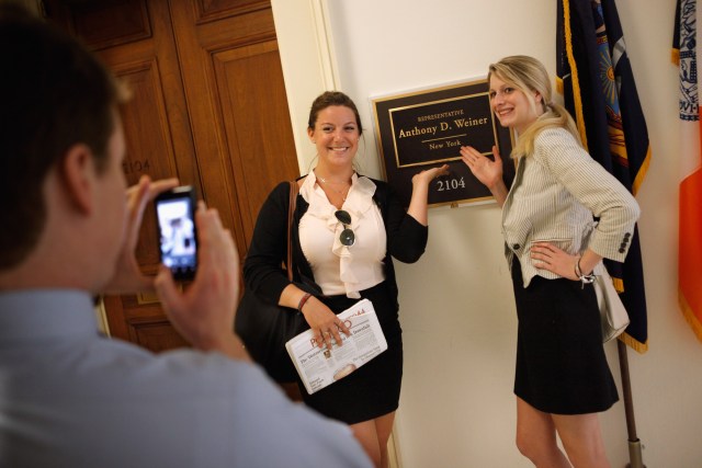 People Pose Outside Weiner's Office