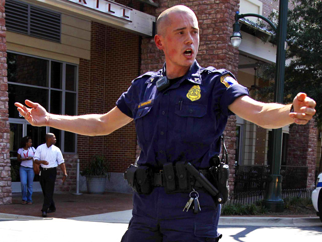 Dramatic Photos: Gunman Storms Discovery Building