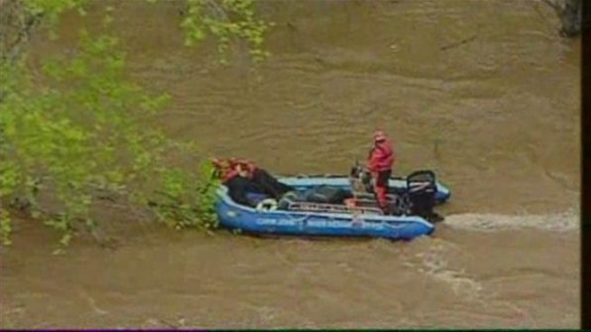 A woman is rescued from the Potomac River by the Cabin John River Rescue Squad.