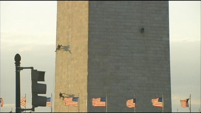 A wind gust tossed one of the engineers inspecting the Washington Monument 30 feet off the wall on Friday.  Erik Sohn said he kind of liked the experience.