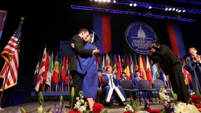New American University graduate Sam Miller proposes to college girlfriend Sarah Cooper during Sunday's Commencement ceremony.