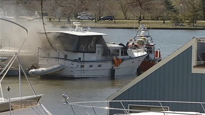 A boat caught fire in southwest D.C. Wednesday morning, and firefighters battled the blaze on the Washington Channel.