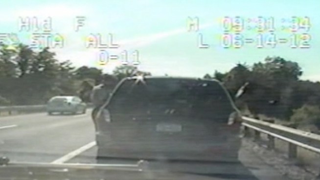 Maryland State Trooper David Avila's dashboard camera caught the moment a tractor trailer sideswiped him during a traffic stop.