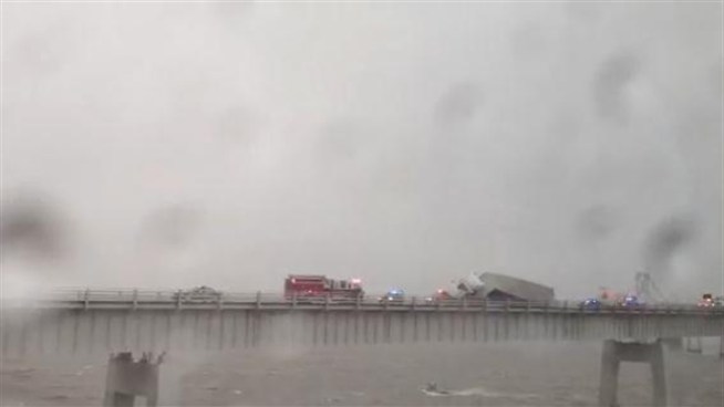 RAW VIDEO: A truck crashed on the Bay Bridge in high winds and rain March 6.