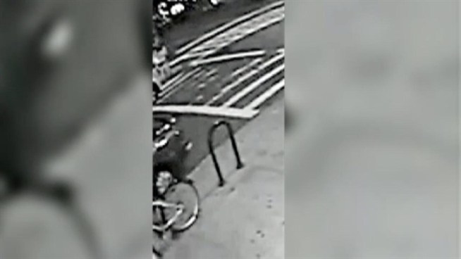 Police are looking for the woman seen in this surveillance video in connection with a deadly subway push in Queens.
