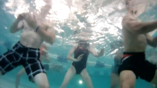 Check out one wet workout. One man swivels and shakes his hips to weight loss, teaching Aqua Zumba in the pool.