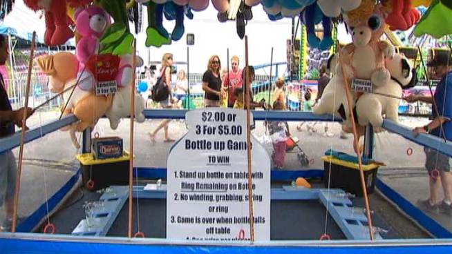 The News4 I-Team is going to show you the secret behind some of those carnival games -- starting with three milk bottles.