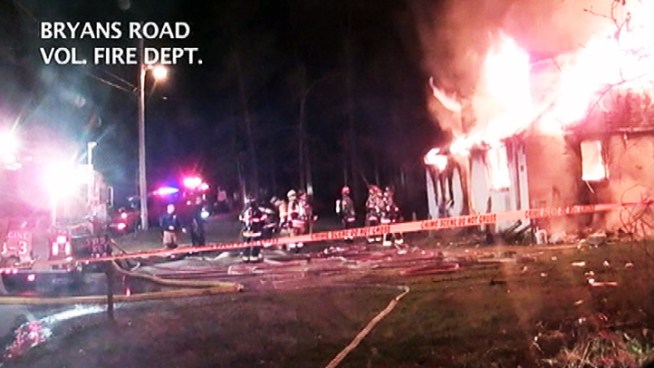 A 66-year-old woman died in a house fire early Wednesday after family members were unable to reach her.