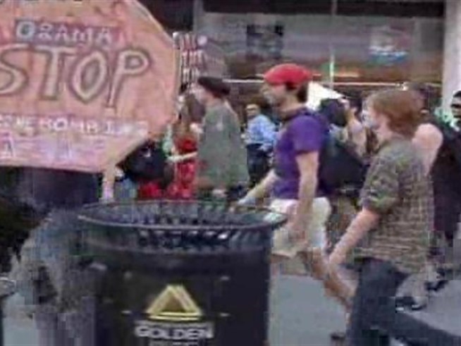 Students protest war with a mobile dance party.