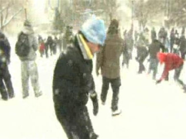 Snowball fighters brave the elements for another Dupont Circle battle.