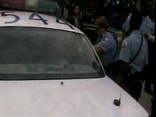 After the sudden announcement that 229 teachers would be laid off, school officials escorted the teachers out of their classrooms. Police were soon called in to keep the situation under control.