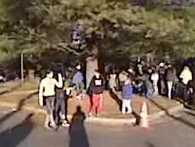 People line up early for a H1N1 shot in <a title=