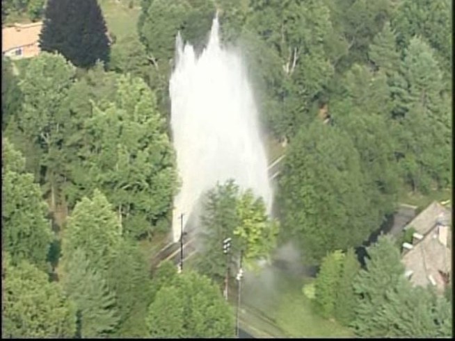 A broken water main sends water 100 feet in the air in <a title=