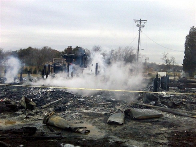 View the aftermath of the five-alarm fire near the Chesapeake Bay.