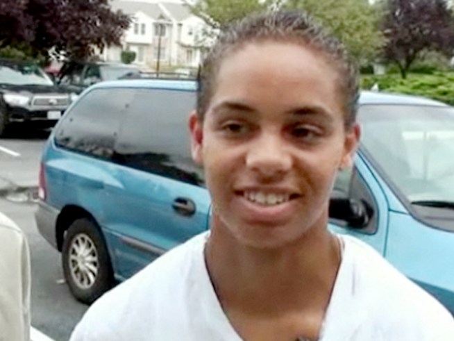 A high school principal reverses a decision to require a lesbian to wear a drape like the other girls in order to have her picture taken for the yearbook.