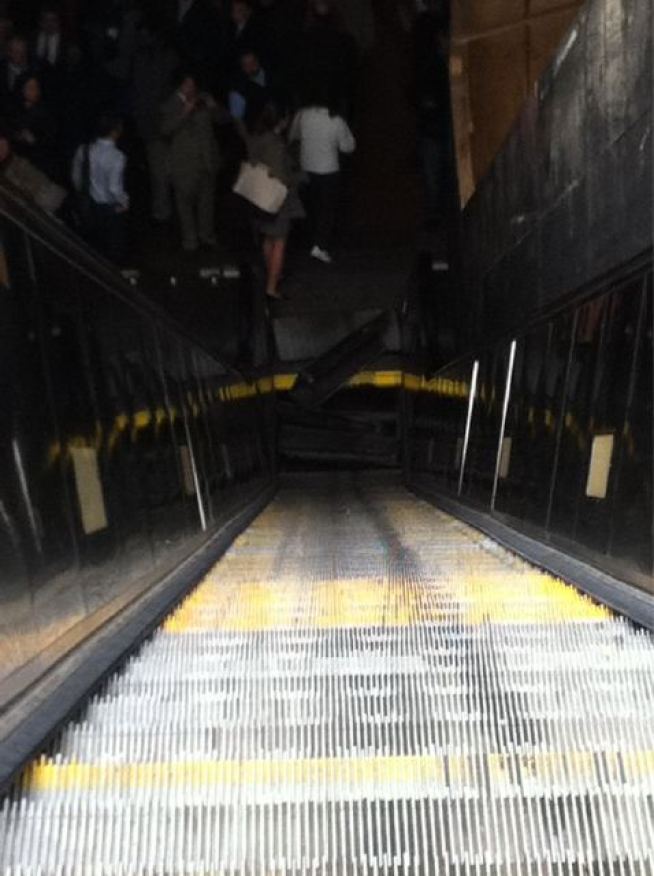 Several steps of an escalator at the Foggy Bottom station apparently collapsed into the machinery.