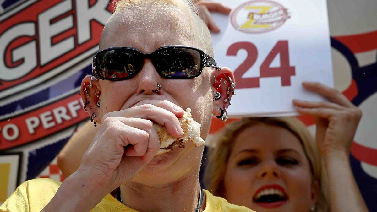 Competitive Eating Champ Scarfs 27 Burgers In 10 Minutes