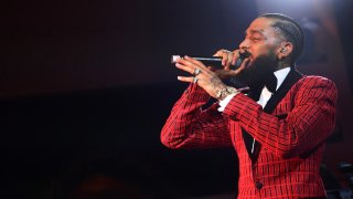 Nipsey Hussle performs onstage at the Warner Music Pre-Grammy Party in Los Angeles on Feb. 7, 2019. The Grammy-nominated rapper was shot and killed outside an L.A. clothing store he owns on Sunday, March 31, 2019. He was 33.