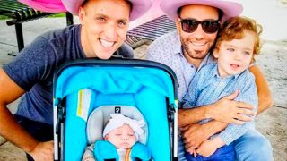 This undated photo provided by Immigration Equality shows Roee, left, and Adiel Kiviti, right, with their children newborn, Kessem and older brother Lev.