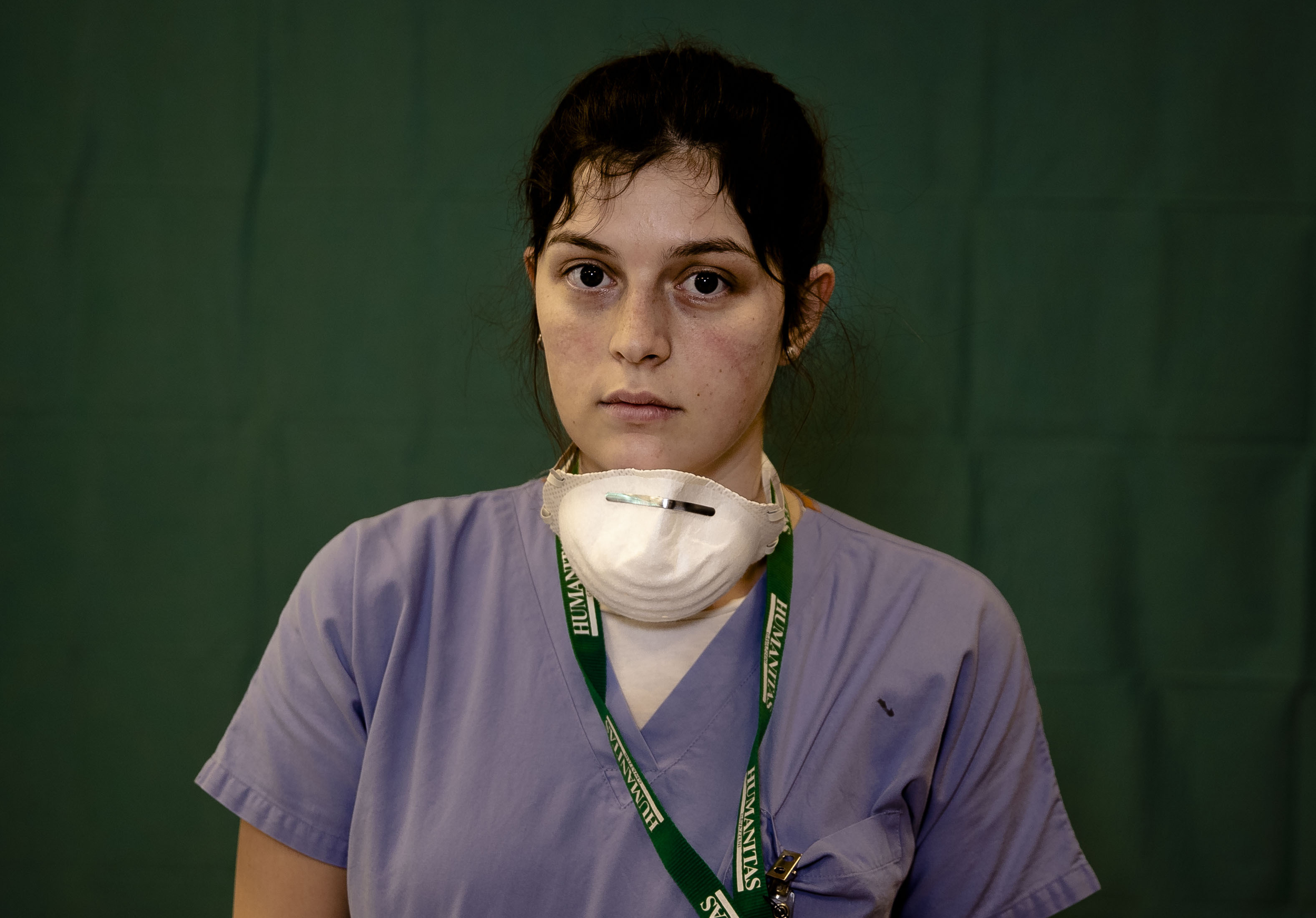 Lucia Perolari, 24, a nurse at the Humanitas Gavazzeni Hospital in Bergamo, Italy, poses for a portrait at the end of her shift, March 27, 2020.