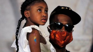 Gianna Floyd, the daughter of George Floyd, listens to a a news conference with Stephen Jackson, Tuesday, June 2, 2020, in Minneapolis, Minn.