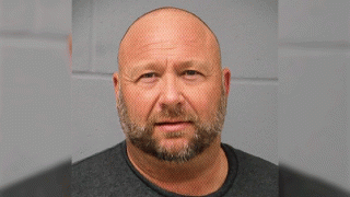 In this Tuesday, March 10, 2020 booking photo provided by the Travis County (Texas) Sheriff's Office is Alex Jones.