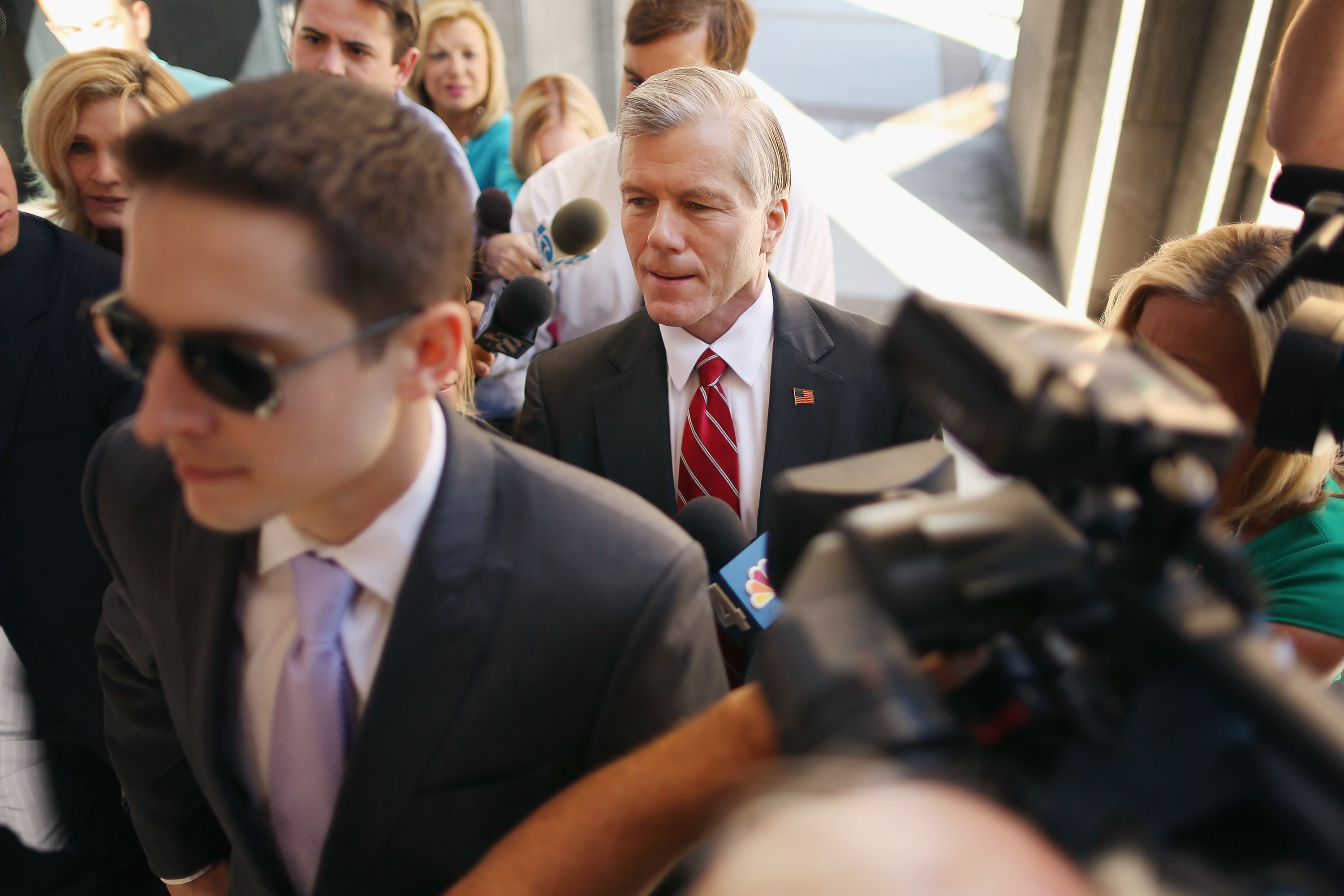 In 2014, former Virginia Gov. Bob McDonnell was convicted of accepting more than $165,000 in gifts and loans from a wealthy businessman in exchange for promoting a dietary supplement. A jury found McDonnell guilty of breaking a law that bars public officials from taking gifts in exchange for "official action." McDonnell said he never took any official action to benefit Star Scientific Inc. CEO Jonnie Williams or pressured other public officials to do so. McDonnell said he simply performed routine courtesies for Williams, like setting up meetings and hosting events. Prosecutors said McDonnell accepted personal benefits with the understanding he would try to take official action to help Williams. McDonnell was sentenced to two years in prison but remained free during his appeal, and the U.S. Supreme Court later overturned the conviction in 2016, ruling the jury received faulty instructions about what constitutes bribery. Prosecutors declined to retry McDonnell, dropping the case.