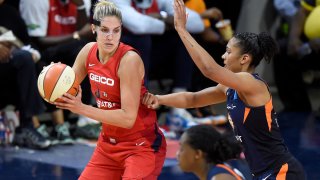 Elena Delle Donne handles the ball against Alyssa Thomas of the Connecticut Sun in Game 5 of the 2019 WNBA Finals.