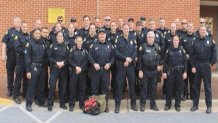 Frederick Police officers pose for photo before being dispatched to Baltimore unrest