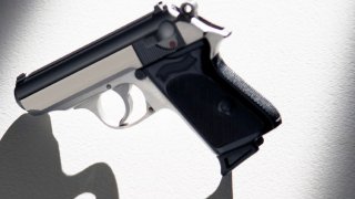 7578054Handgun on white background, backlit and casting shadow0 generic handgun gun
