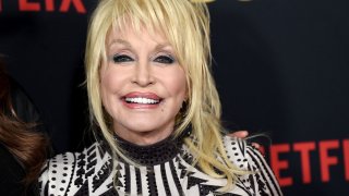 In this Dec. 6, 2018, file photo, Dolly Parton arrives at the premiere of Netflix's "Dumplin'" at the Chinese Theater in Los Angeles, California.
