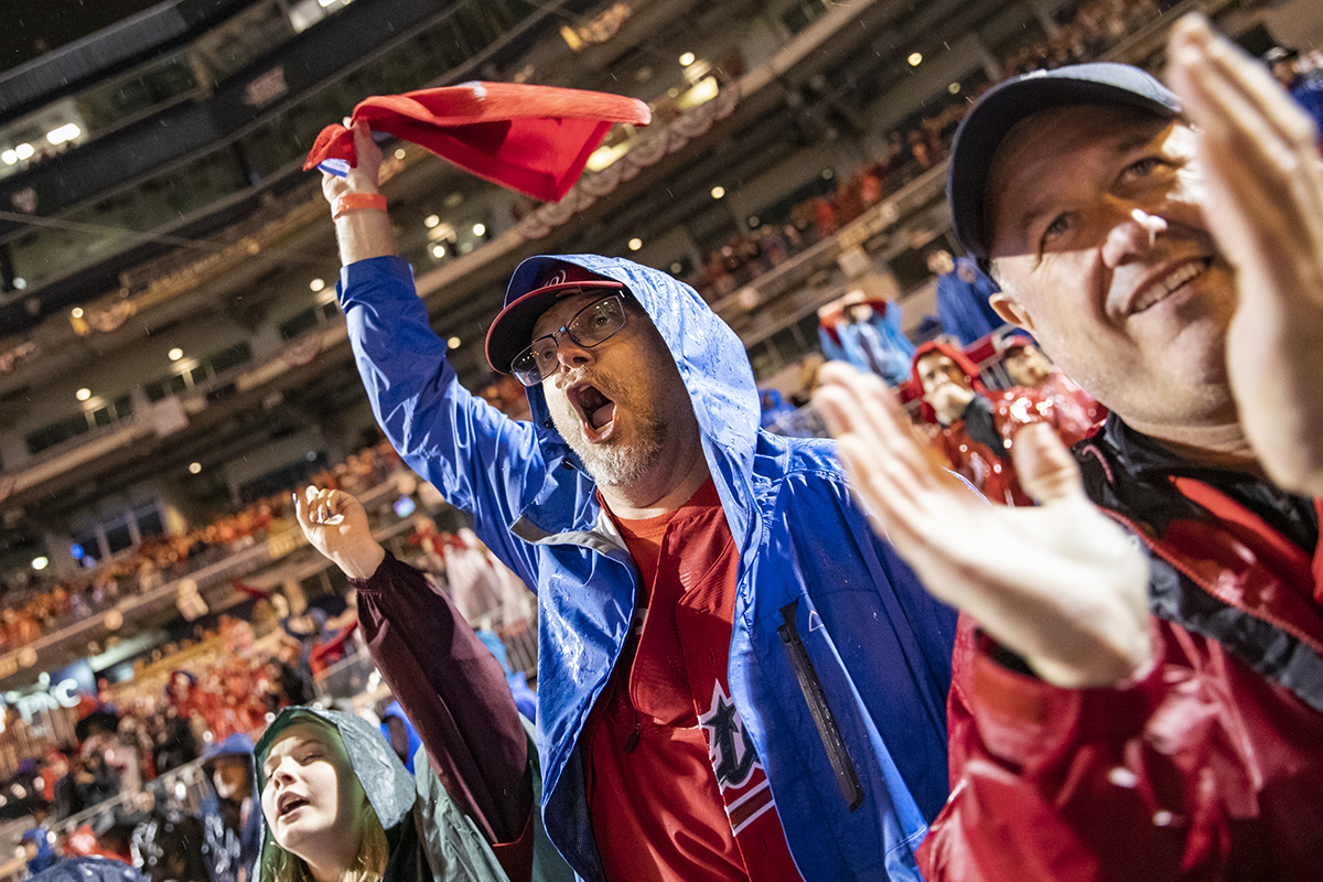 Nationals fans react to the home run that gave the Washington Nationals the lead in Game 7 of the World Series at an official watch party at Nationals Park. (Photo by Samuel Corum/Getty Images)