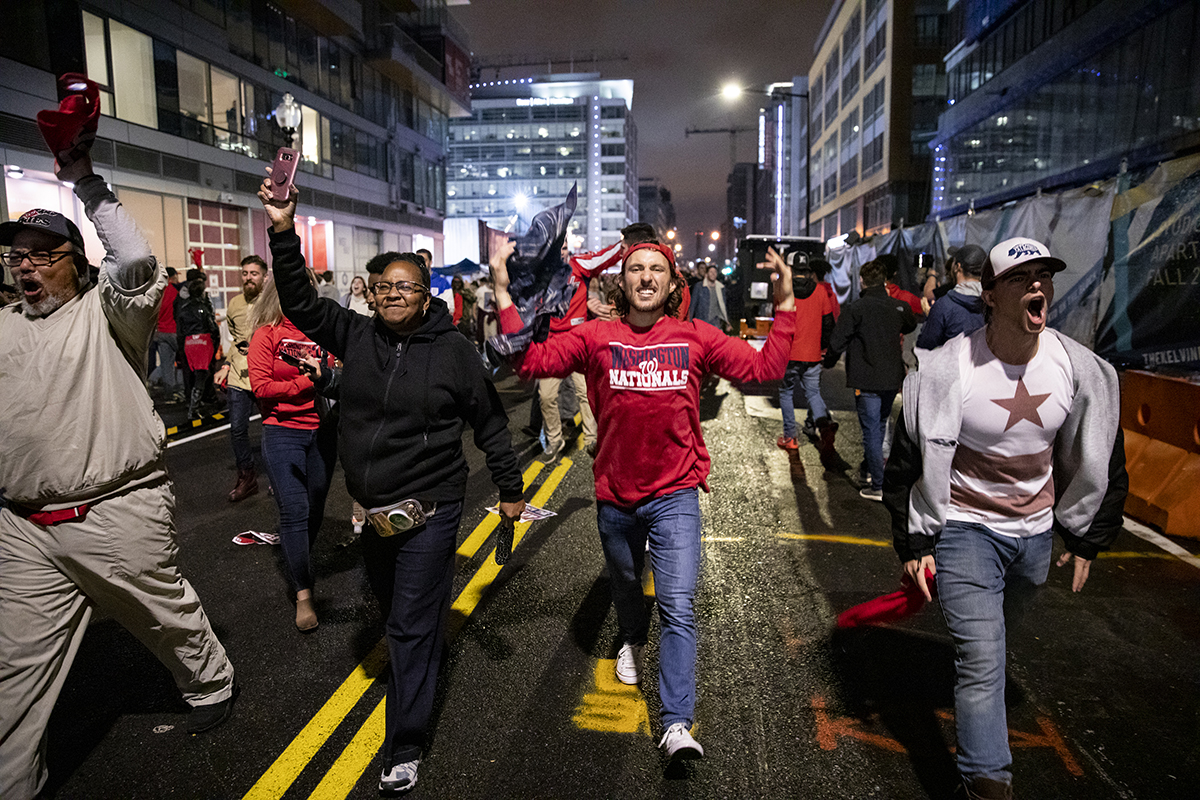 Nationals fans stream into the streets. (Photo by Samuel Corum/Getty Images)