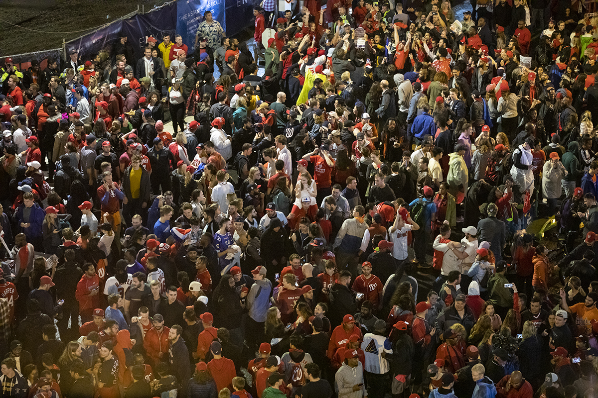Nationals fans stream into the streets outside Nats Park celebrating the team's World Series victory on Oct. 30, 2019 in Washington, D.C. The Washington Nationals defeated the Houston Astros 6-2 in Game 7 of the World Series. (Photo by Samuel Corum/Getty Images)