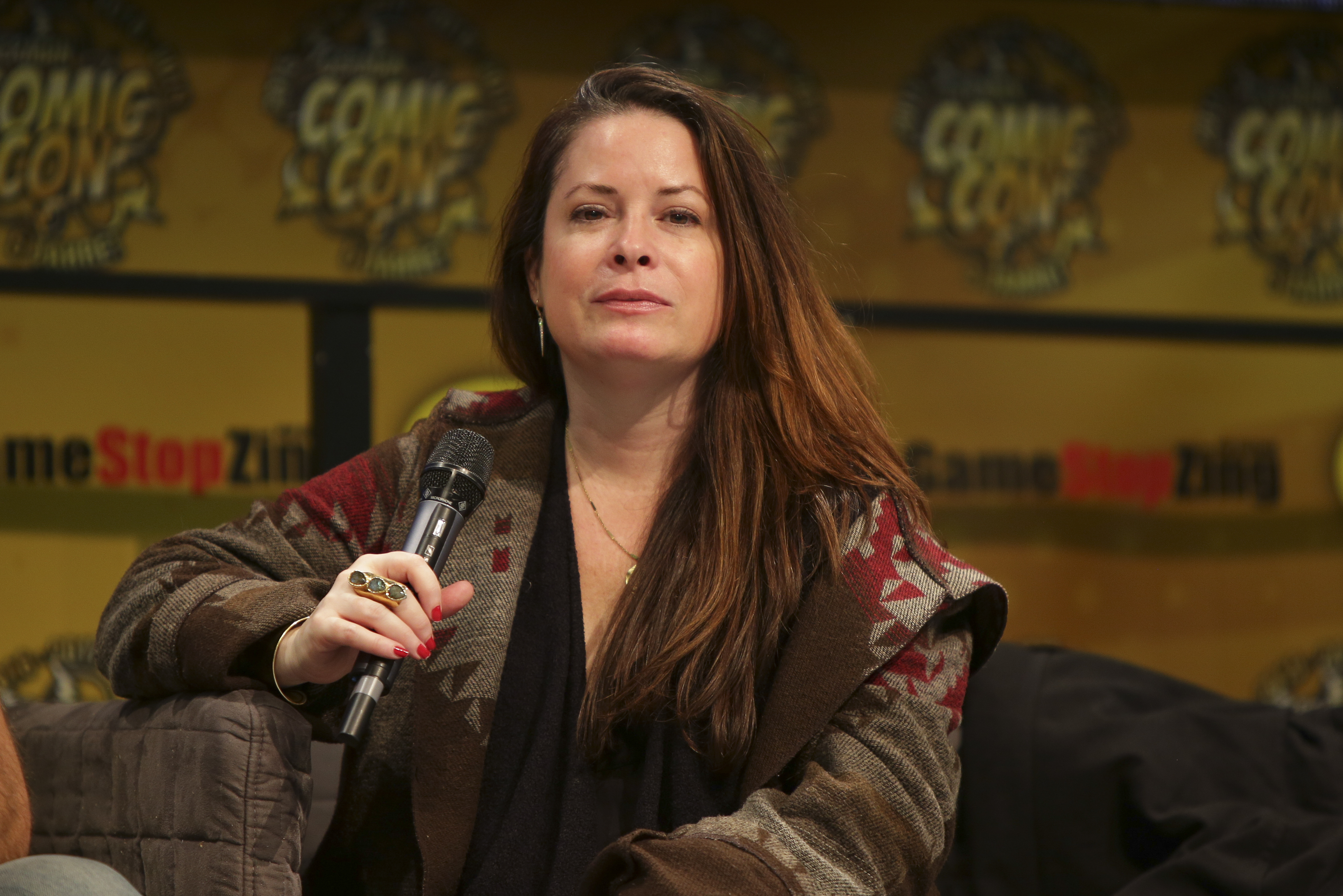 ‘Charmed’ Star Holly Marie Combs Slams Trump After Grandfather Dies From Coronavirus