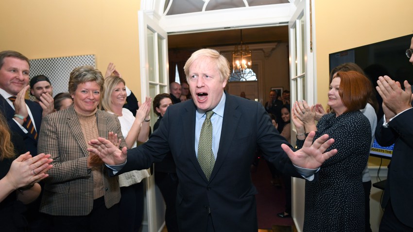 Prime Minister Boris Johnson arrives back at 10 Downing Street after visiting Buckingham Palace where he was given permission to form the next government during an audience with Queen Elizabeth II on Dec. 13, 2019, in London, England.